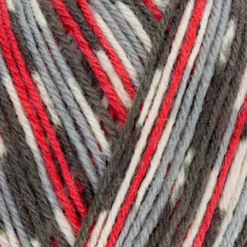 Close-up of multicolored yarn with red, gray, and beige stripes.