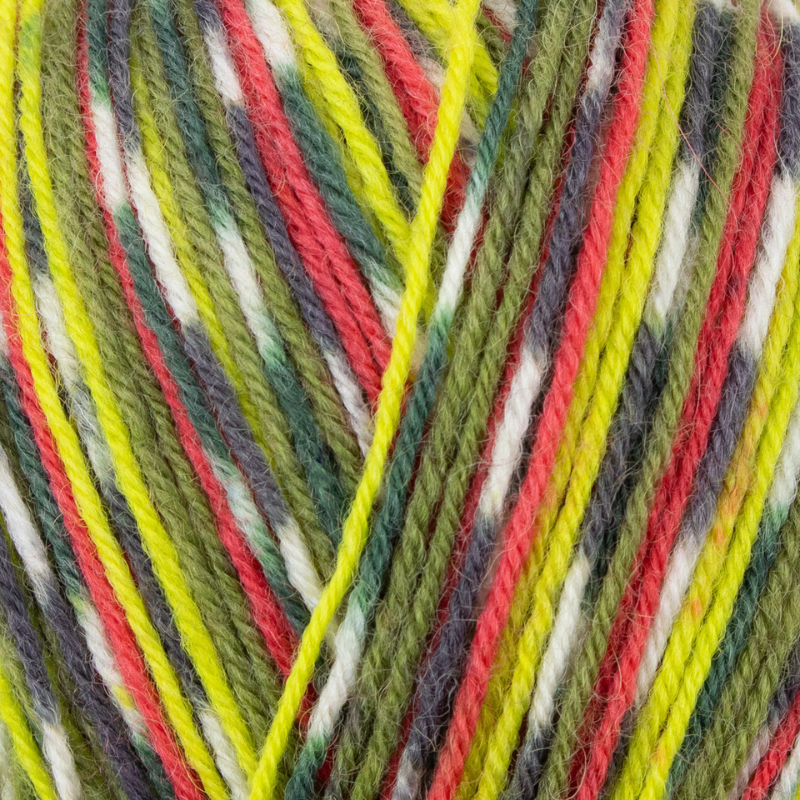 Close-up of multicolored yarn with green, red, yellow, and white strands.