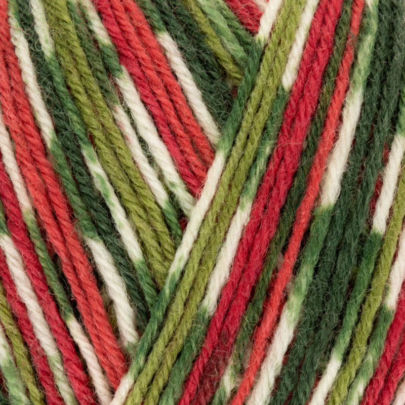 Close-up of multicolored yarn with red, green, and white stripes.