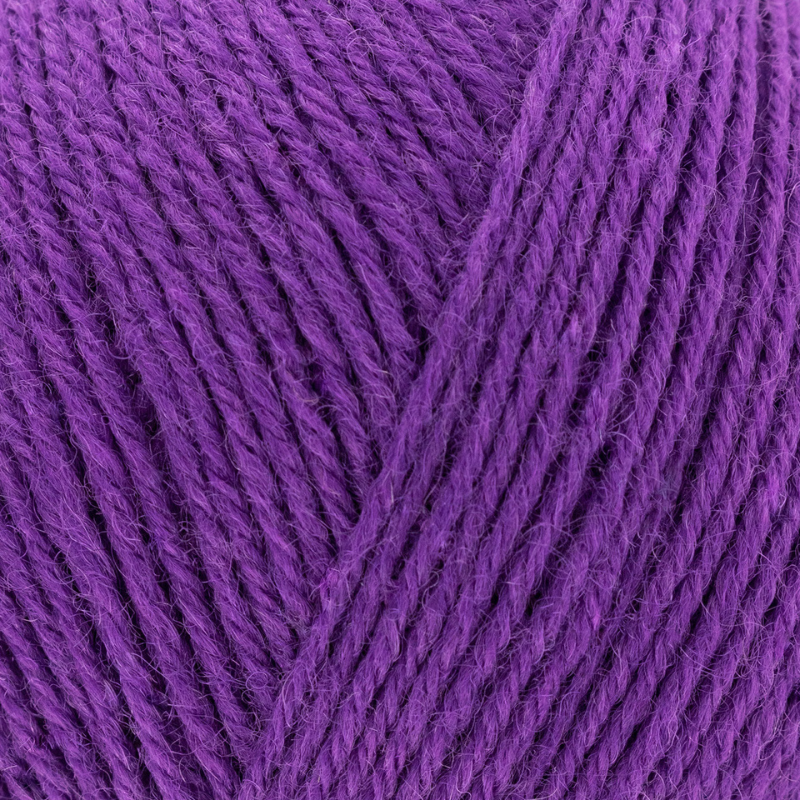 Close-up of purple yarn with a textured pattern