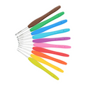 Set of colorful crochet hooks with brown handle on a white background