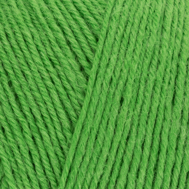 Close-up of green yarn with a textured pattern