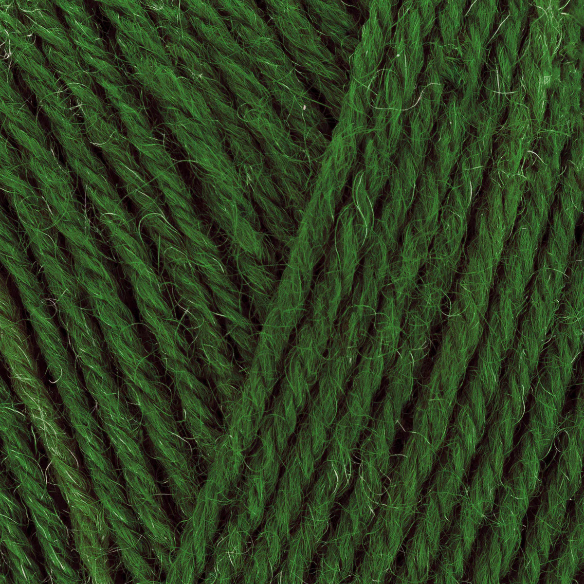 Close-up of green yarn with a clear focus on texture