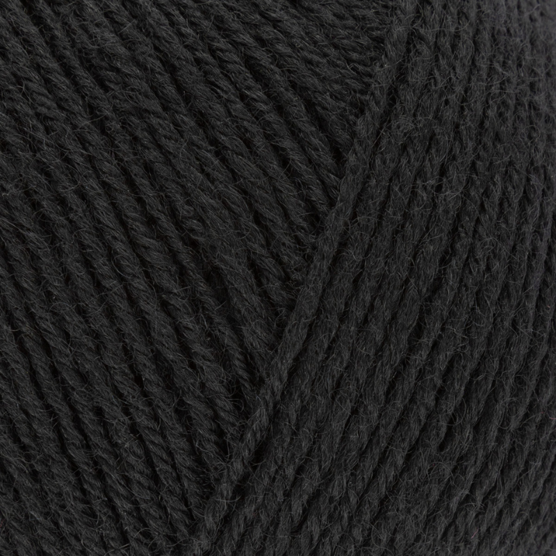 Close-up of black yarn with a visible texture