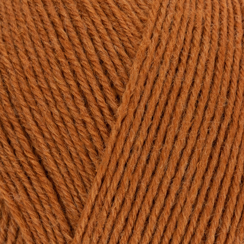Close-up of brown yarn with a textured pattern