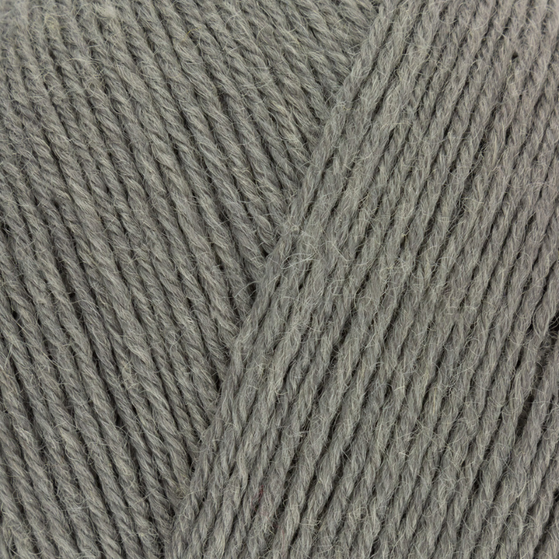Close-up of gray yarn with visible texture
