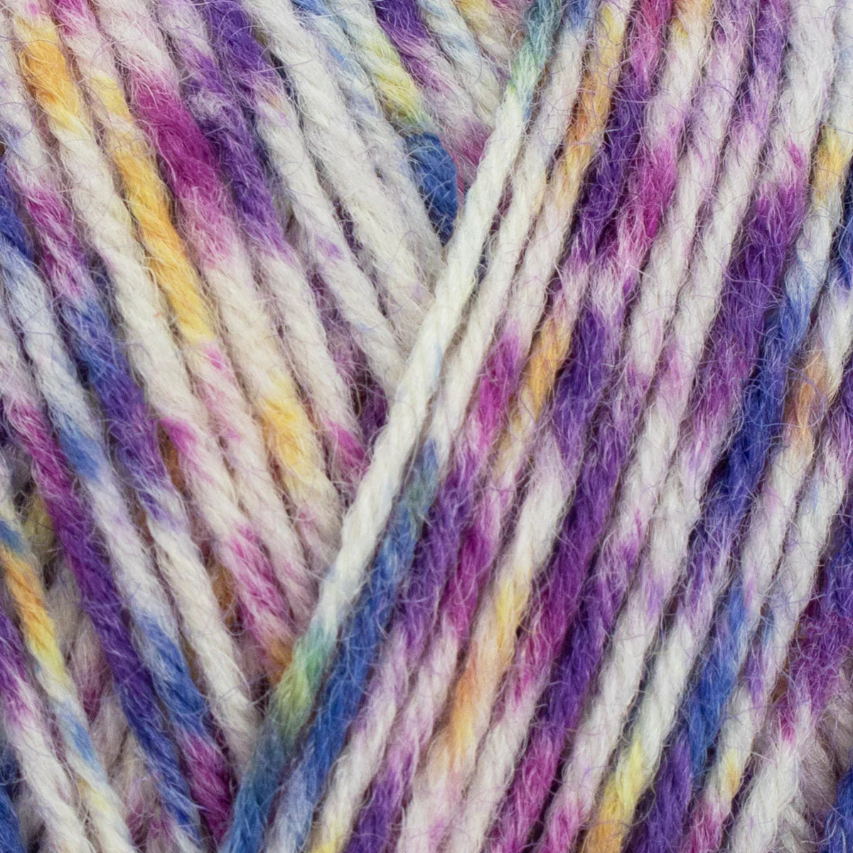 Close-up of multicolored yarn with purple, yellow, and blue hues.