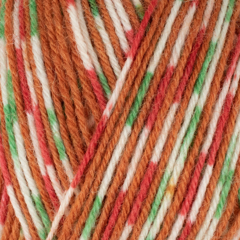 Close-up of multicolored yarn strands in orange, green, and white.